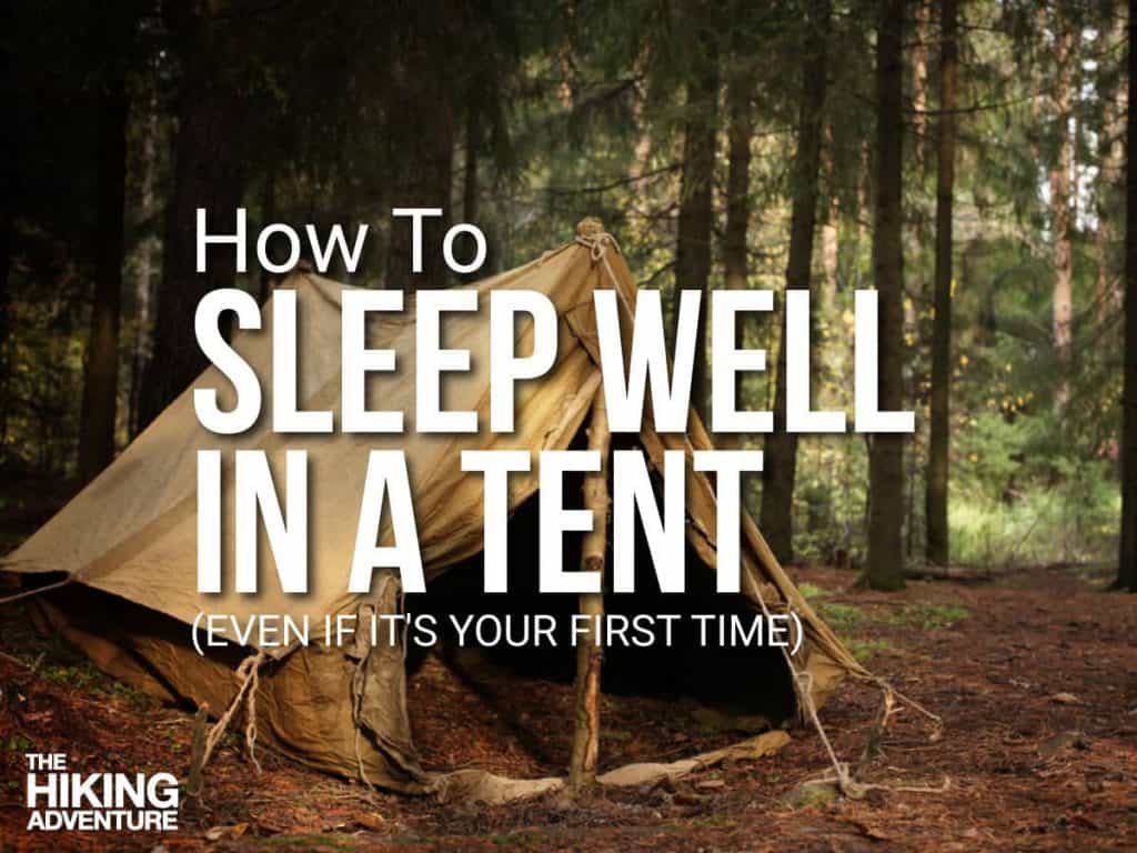 An old fashioned A-frame tent set up in a forest, the trees and soil in the background and to the center of the frame is white text.