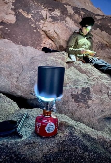 Backpacker using MSR ISOPRO fuel