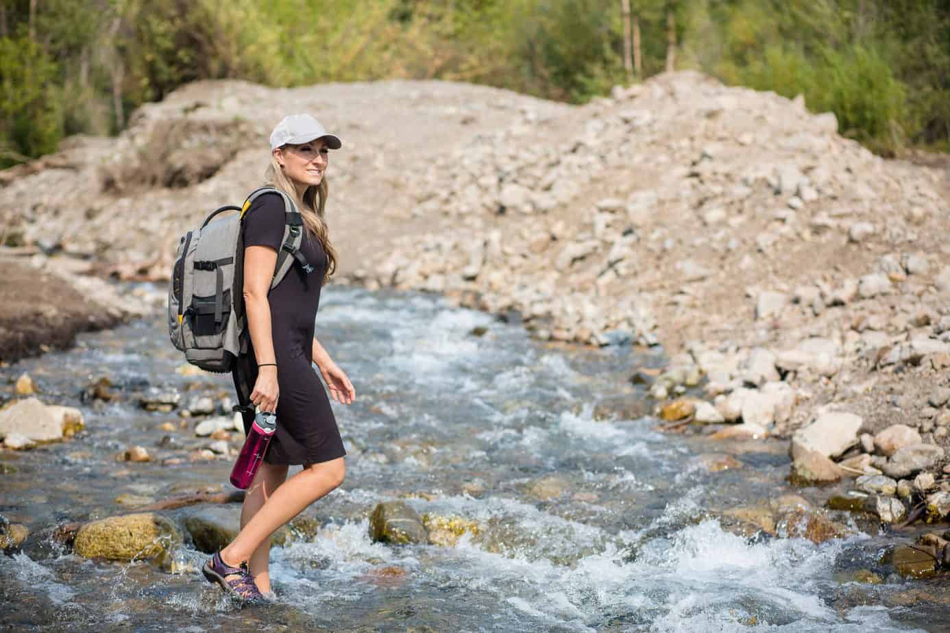 Women crossing steam with water Sandals for women