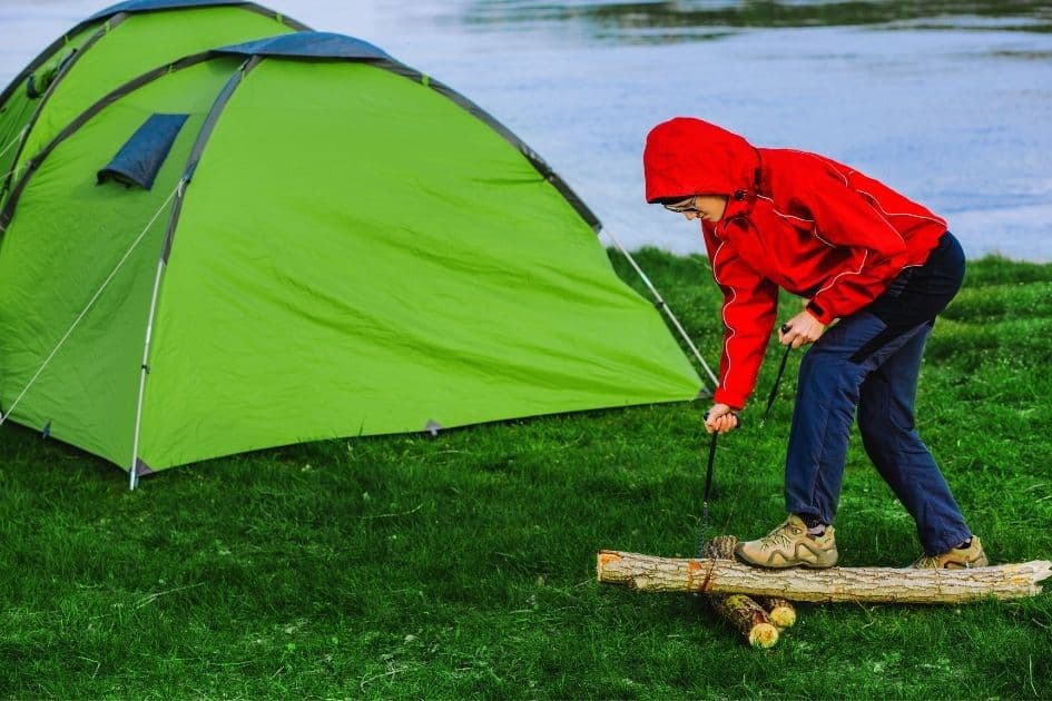 Backpacking pocket chain saw cutting wood