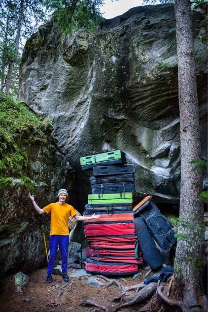 end of a successful bouldering trip-pile of crash pads