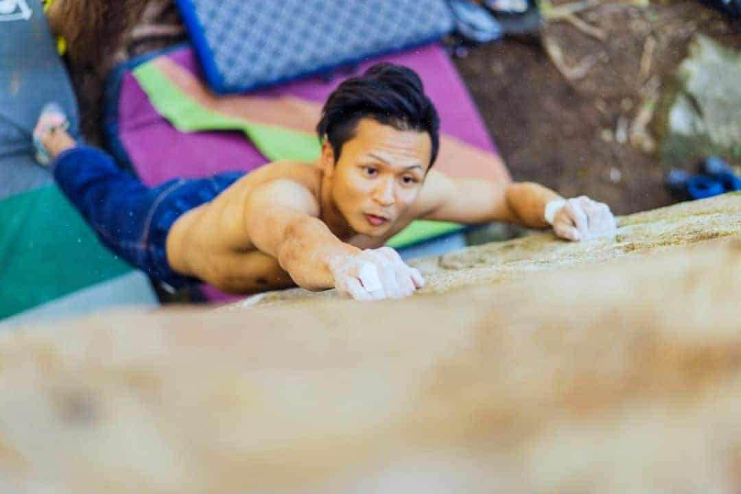 chalk and crash pads are two essentials for bouldering