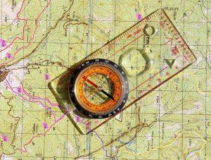 compass and topo map for backpacking