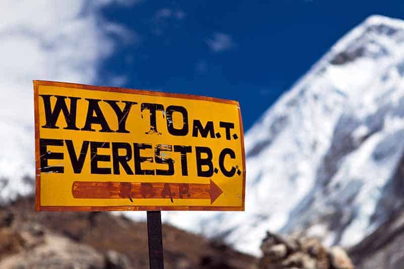 A close up horizontal image of a sign in the Himalayan mountain region.