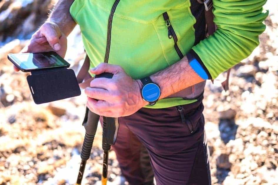 Hiker checking Hiking GPS App