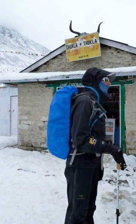 A rain cover to waterproof a daypack