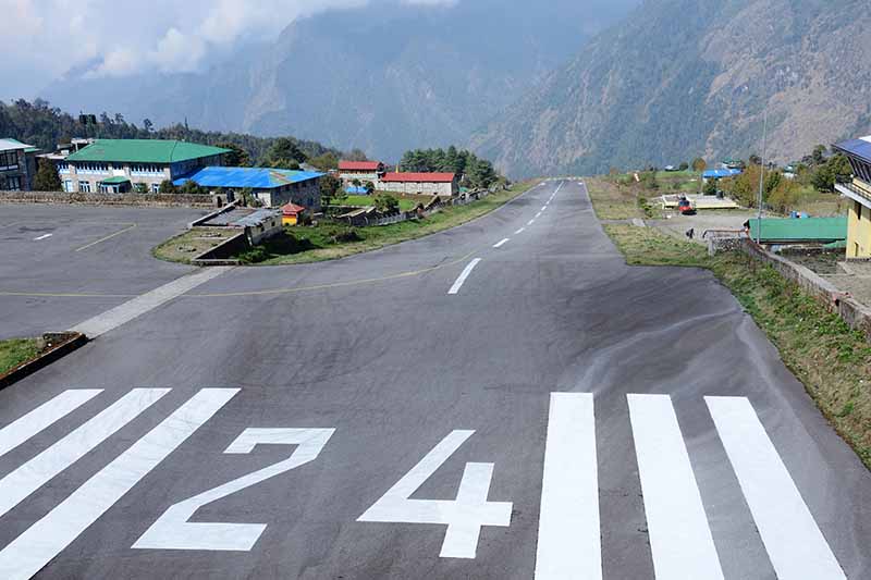 A horizontal image showing the runway at Lukla airport, Nepal.