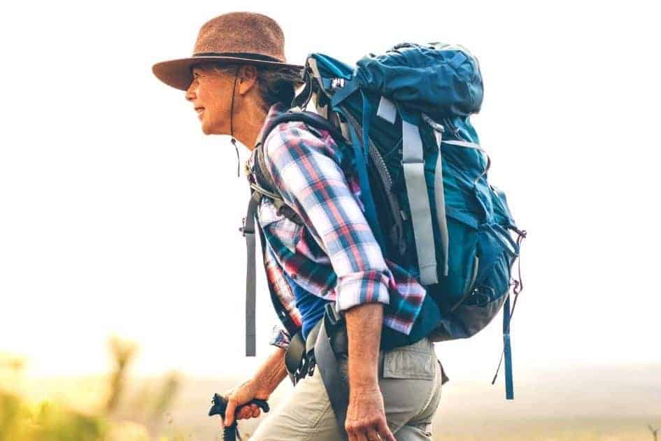 Wide brim hat protects hiker from sun rays