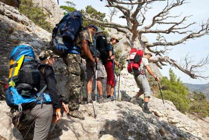 backpackers hiking in mountains