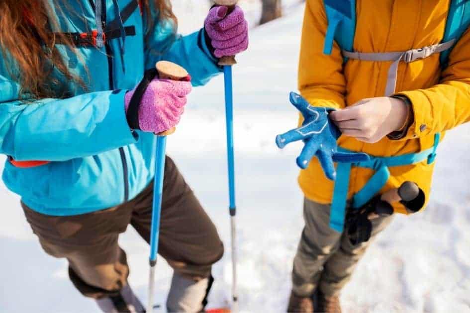 colorful gloves on hiking poles