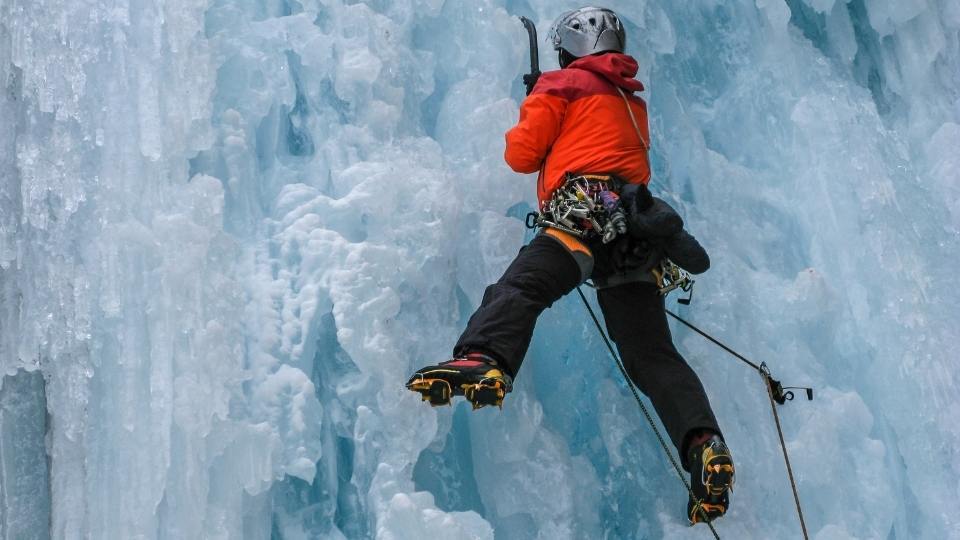 crampon digging into side of glacier