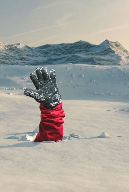 Hand from avalanche when ice climbing