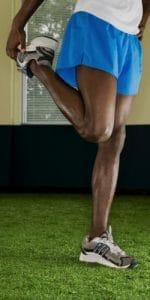 stretch quadricep to prevent injury