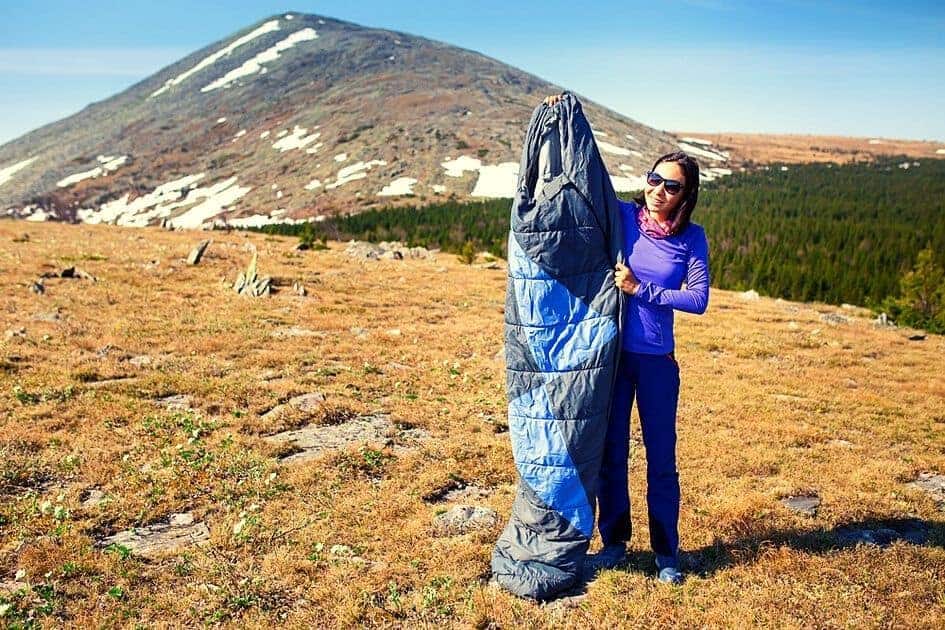 Woman holding Winter Sleeping Bag