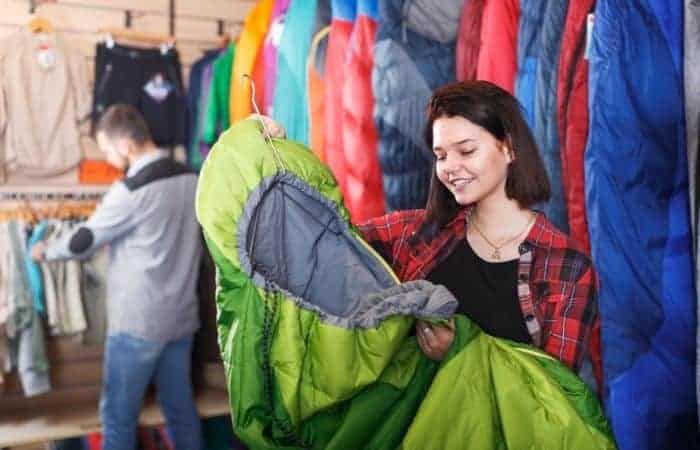 couple buying sleeping bags