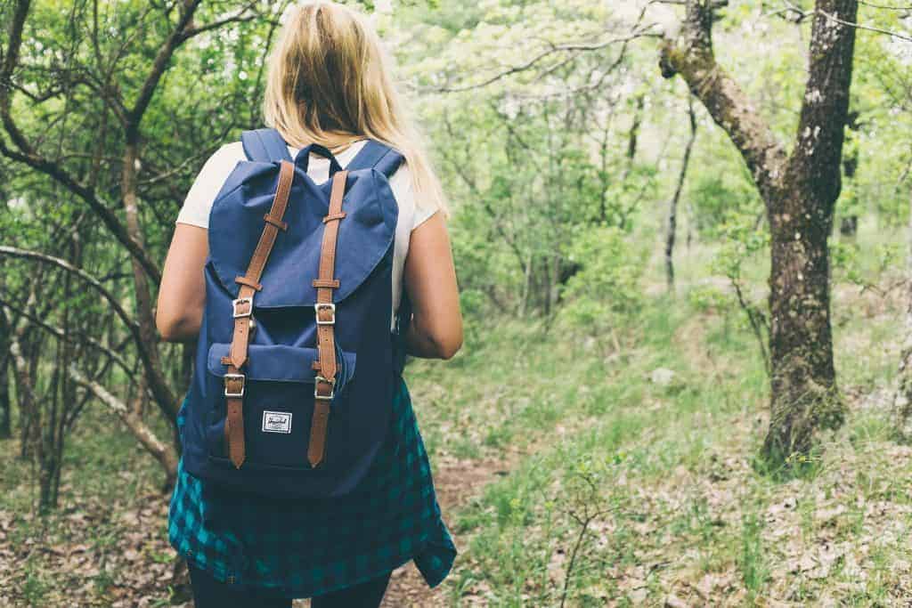 female hiker camping hygiene