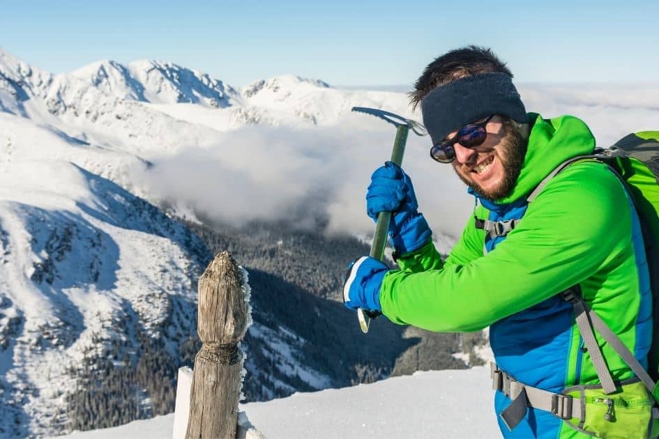 Ice Climber having fun with classic curve ice axe