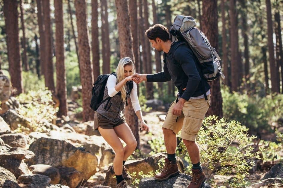 couple hiking in forest