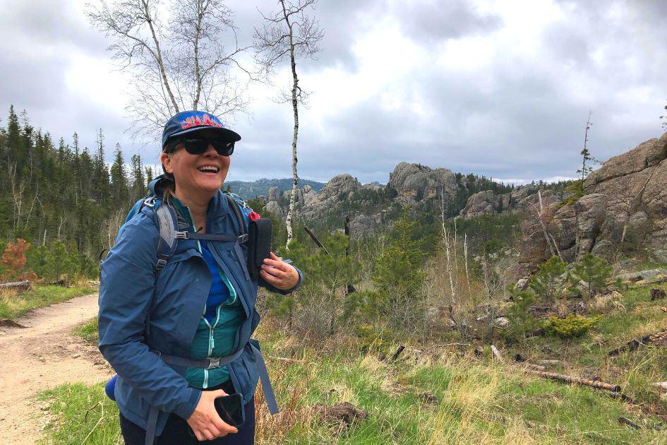 female hiker in forest