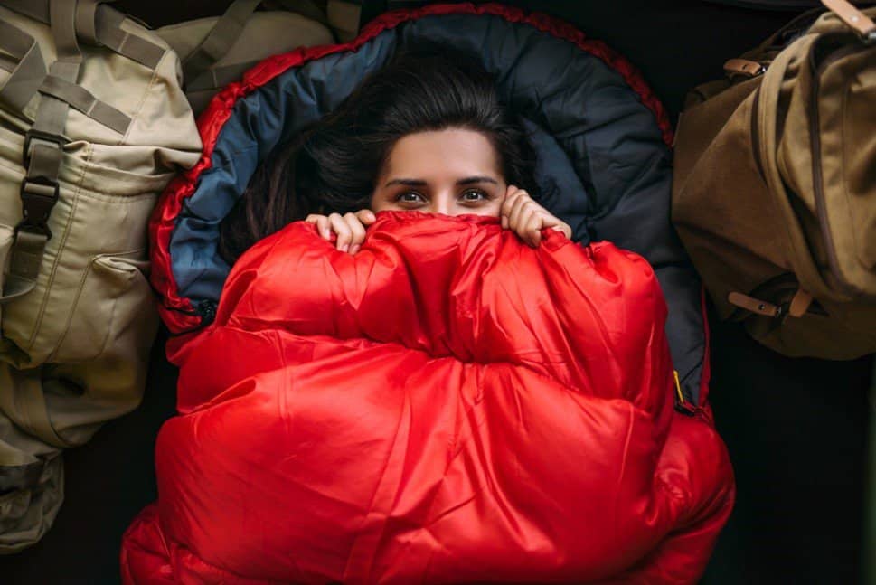 women sleeping in sleeping bag