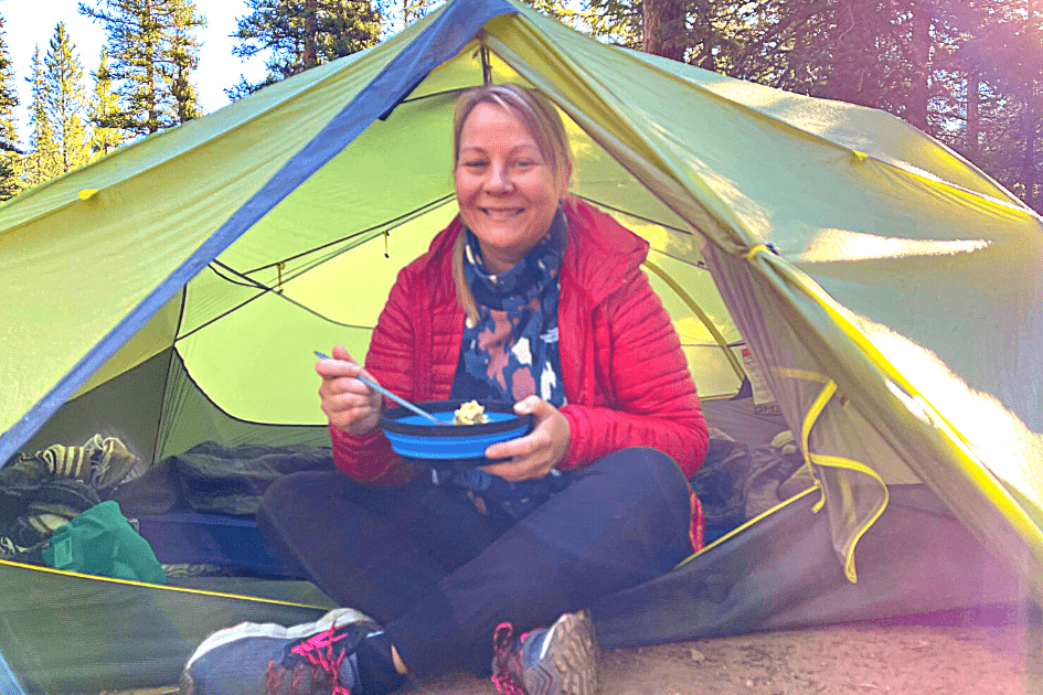 Hiker eating backpacker meal