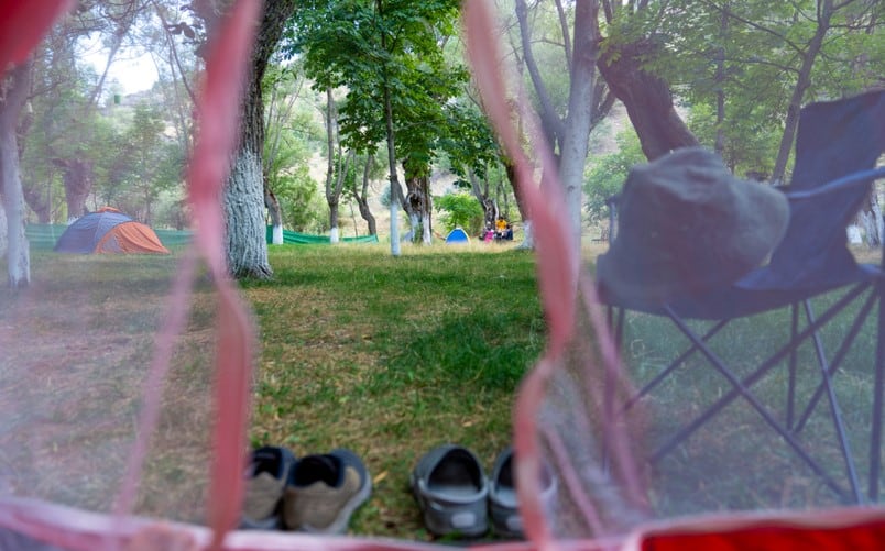 camping slippers outside tent