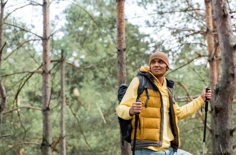 hiker with yellow vest